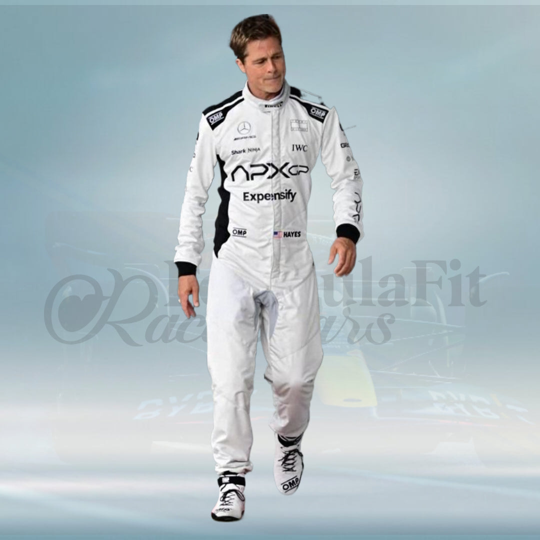 Person wearing a white racing suit with various logos on a light blue background